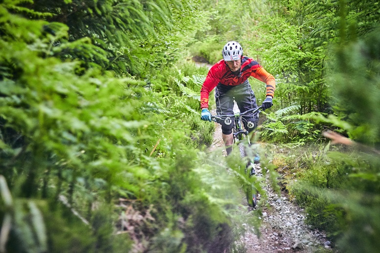 a student mountain biking