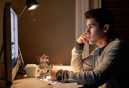 Student working in front of PC screen