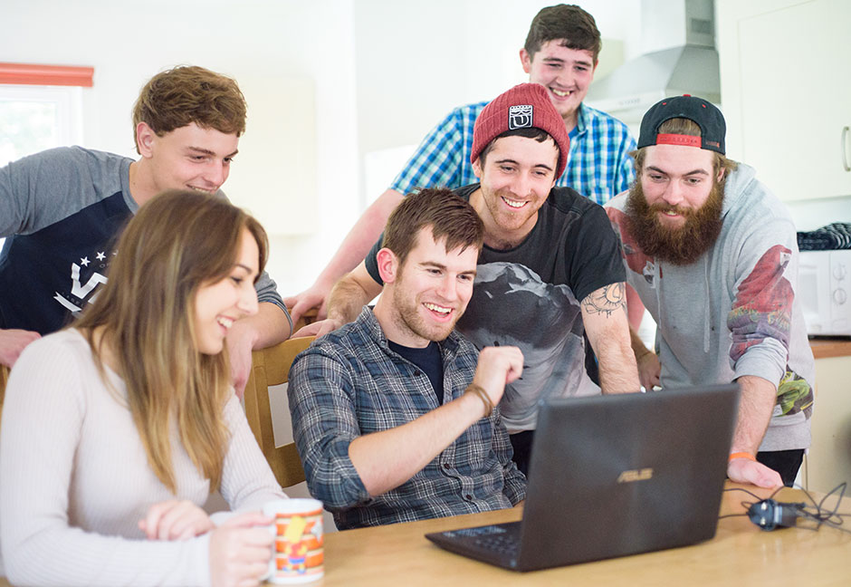 Group of students socialising in student accommodation