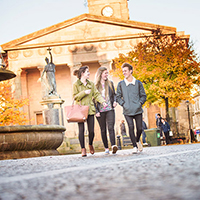 Three people walking