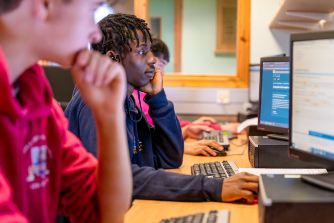 Student studying at a computer