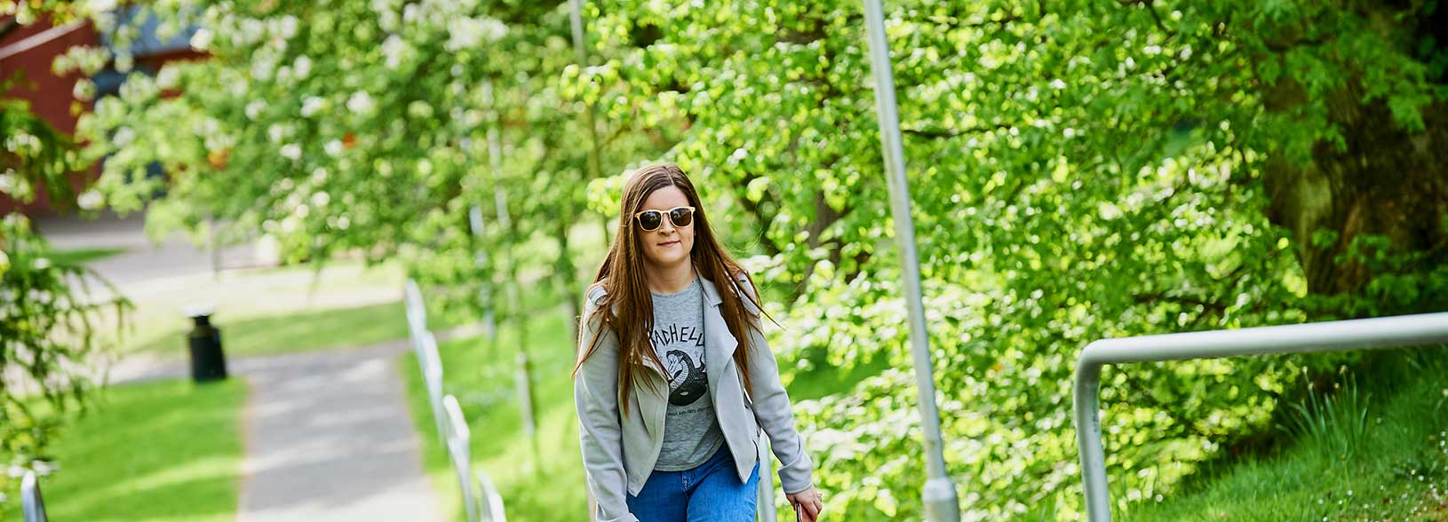 student walking on campus